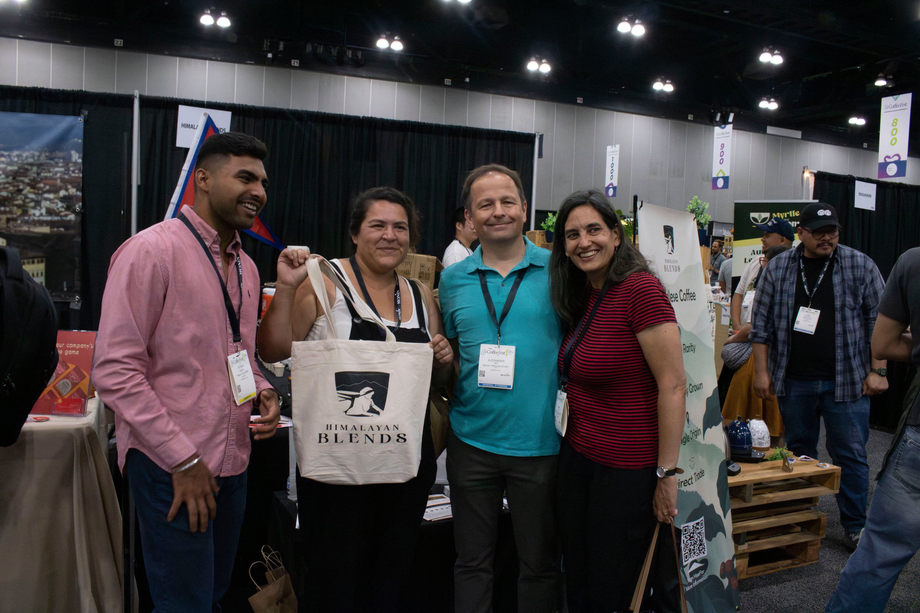 Himalayan Blends team sharing organic coffee beans and tea samples with cafe owners and coffee roasters.