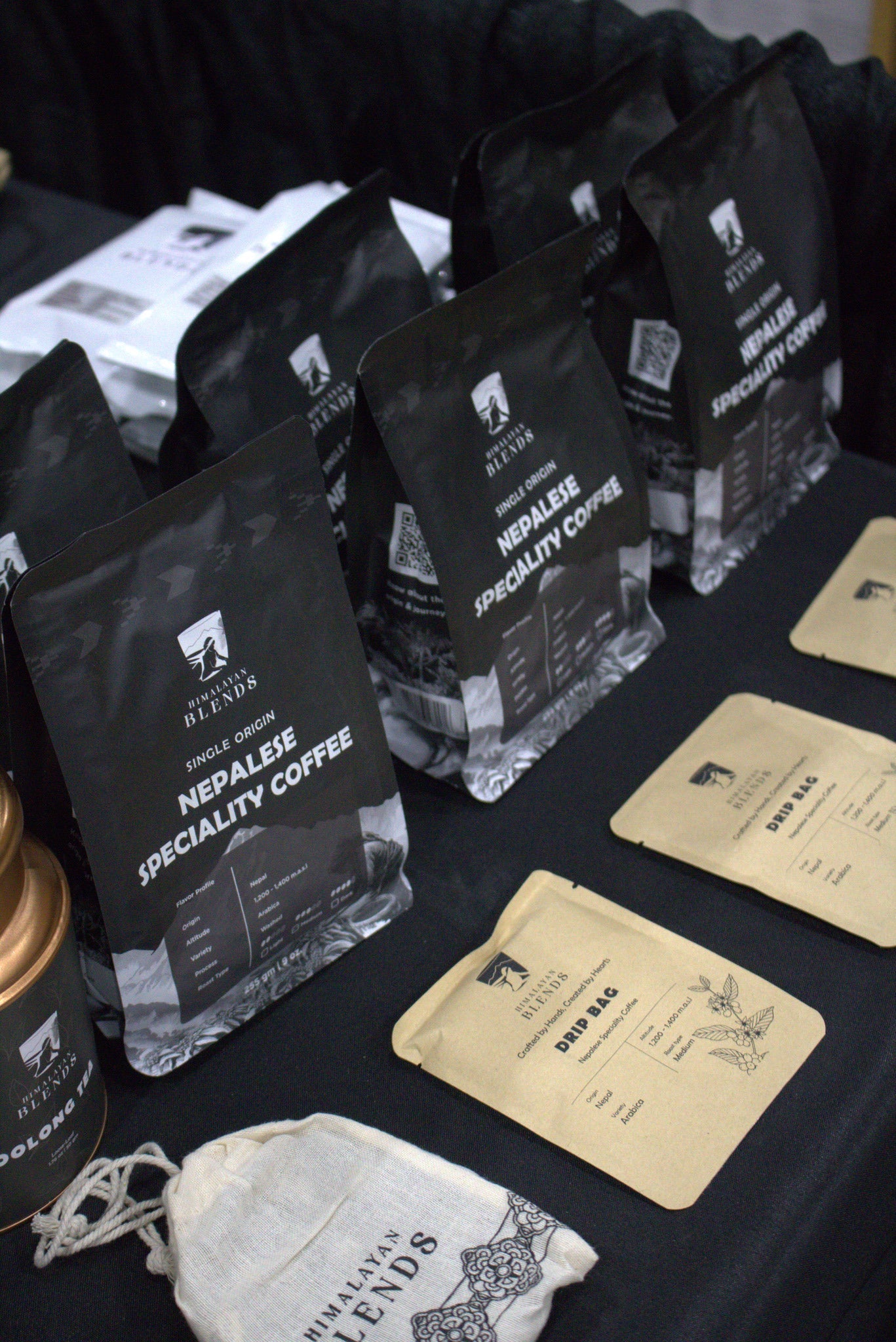 Organic coffee beans and tea leaves from the Himalayas displayed by Himalayan Blends