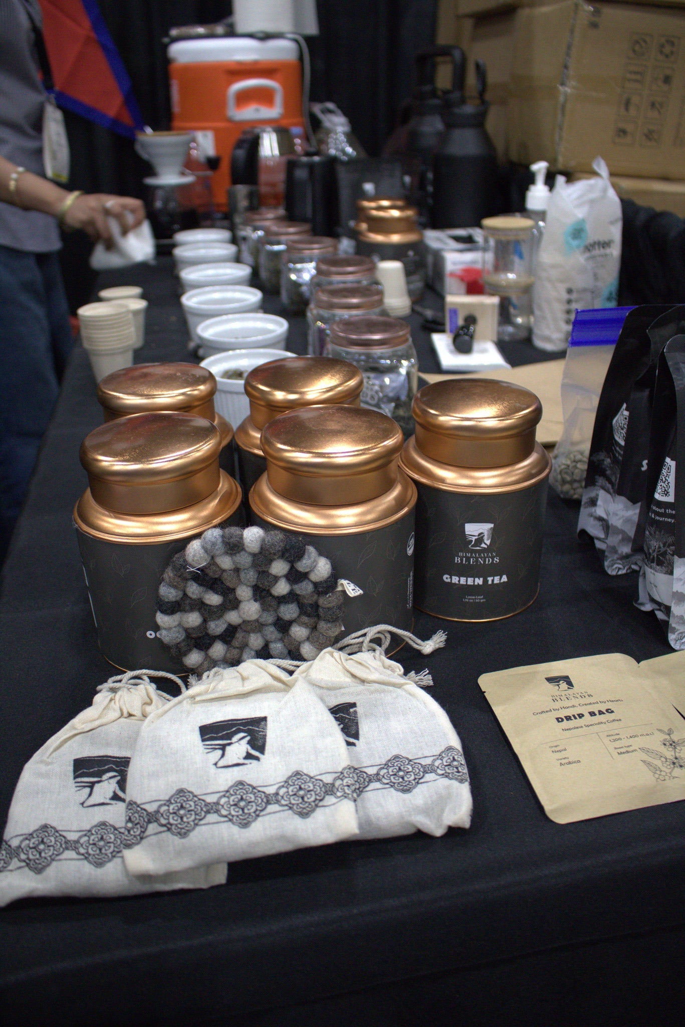 Organic coffee beans and tea leaves from the Himalayas displayed by Himalayan Blends